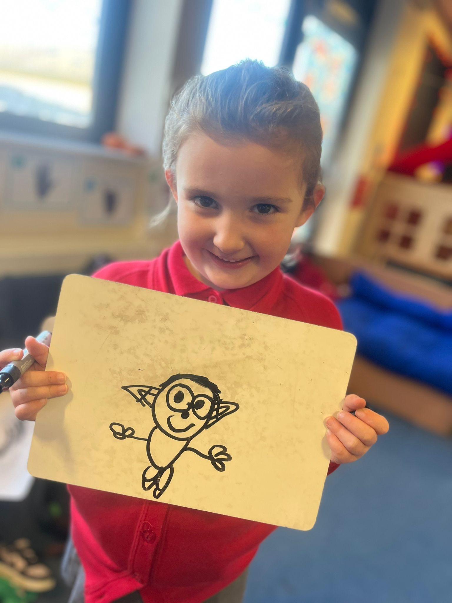 She loves drawing and we love her Elf 