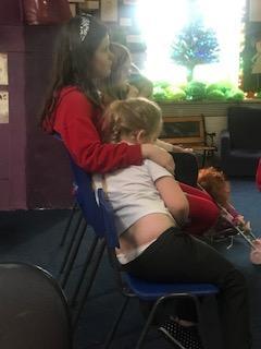 We look after each other in our class. Our older children are excellent role models for the younger members of our class. We are so proud of them. 